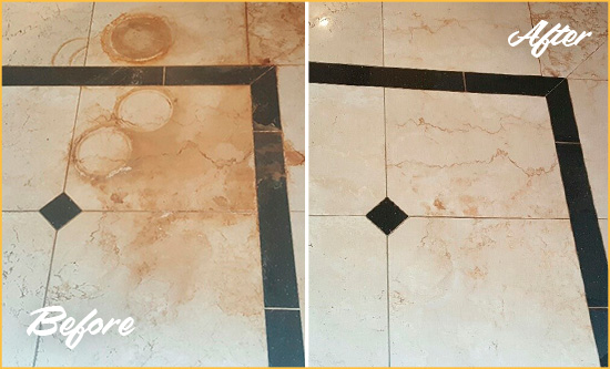 Before and After Picture of a Corona Del Mar Hard Surface Restoration Service on a Marble Floor to Eliminate Rust Stains